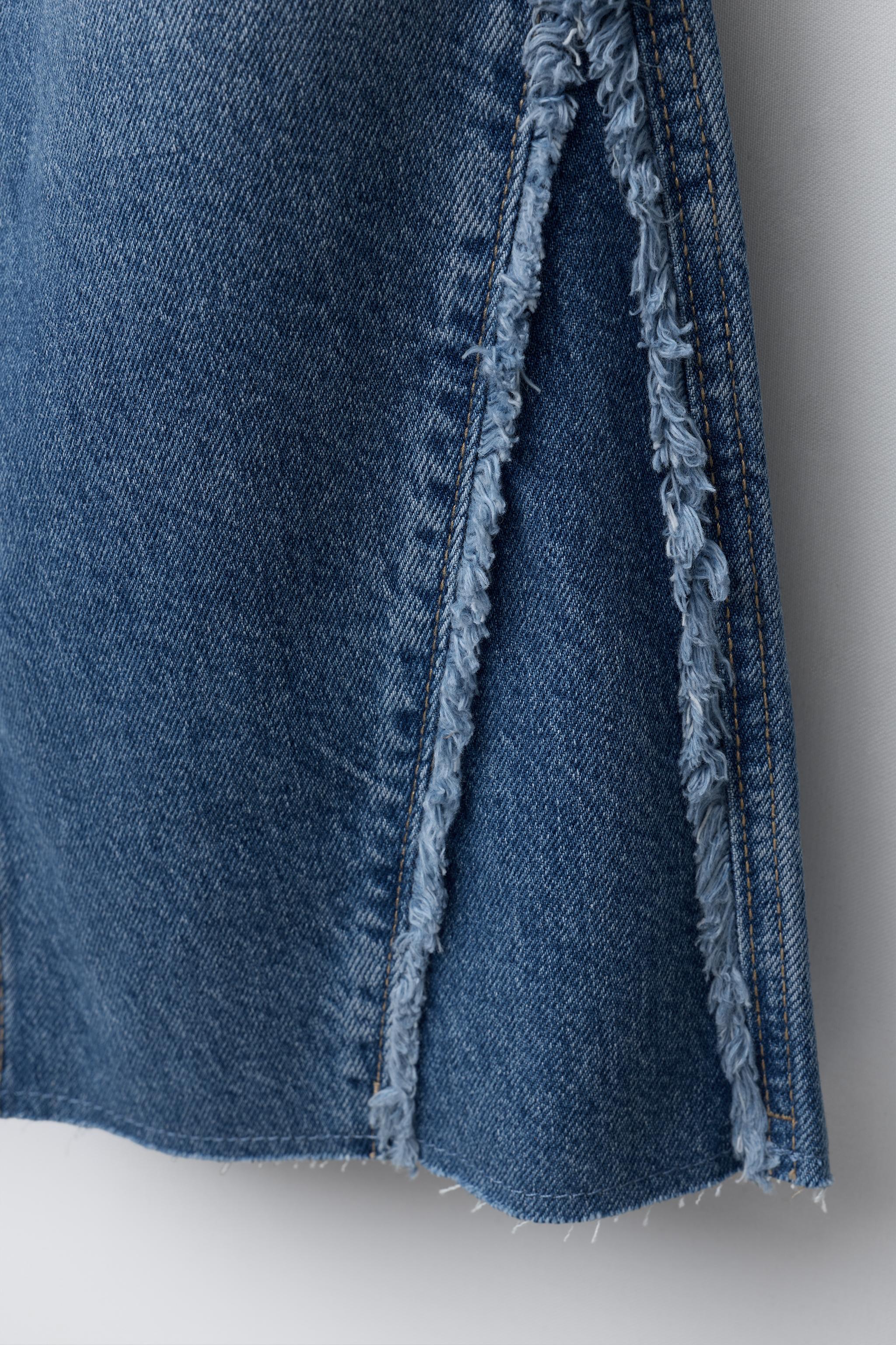 FRAYED BOOTCUT JEANS